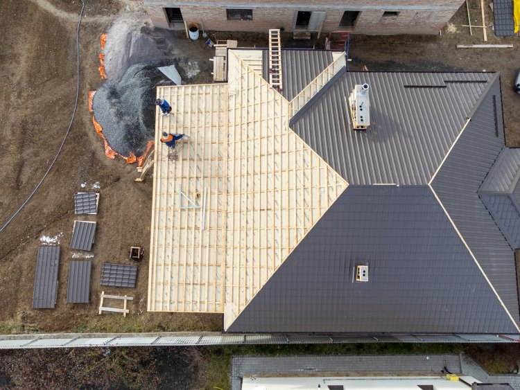 Standing seam metal roof installed on a Michigan home